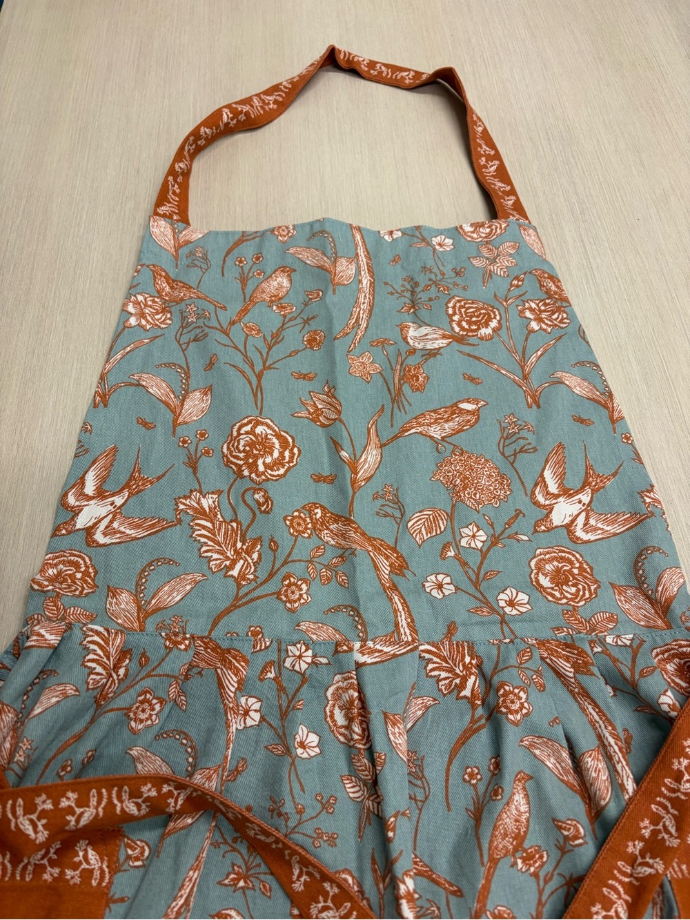 World Market Apron Light Blue and Orange Floral Bird Apron with Pockets - Picture 3 of 10